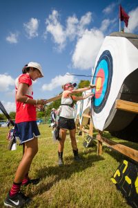 Women and girls are flocking to archery in recent years. Some experts attribute the sport’s growth to films such as ‘Hunger Games’ and ‘Brave.’ PHOTO CREDIT: Teresa Johnson Photography