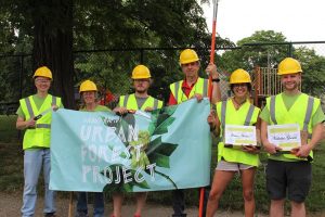 People from all walks of life take part in the city’s Urban Forest Project. So far, 50 residents are certified citizen foresters and another 150 are in training. PHOTO CREDIT: Urban Forest Project
