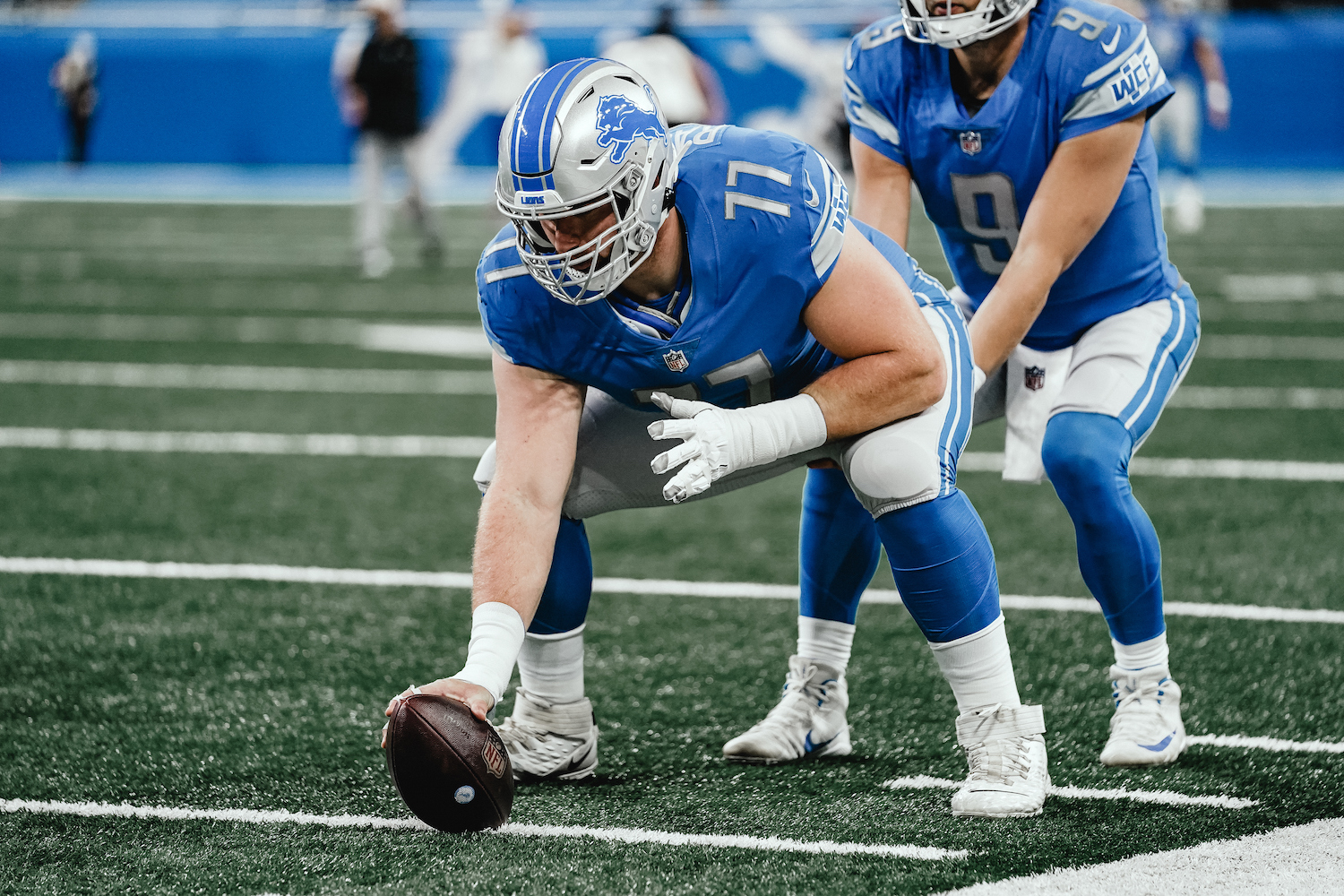 Detroit Lions' center Frank Ragnow is suited up and ready to snap the ball into play